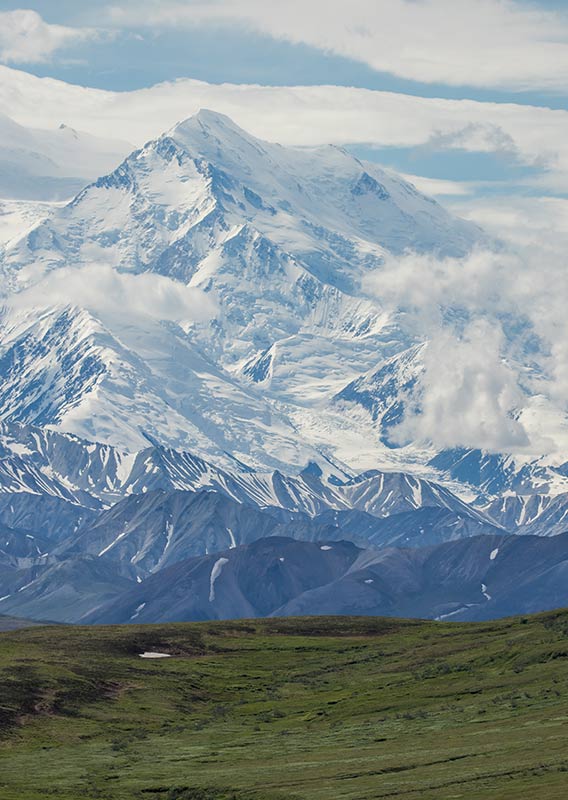 An expansive view of Denali, covered in snow.